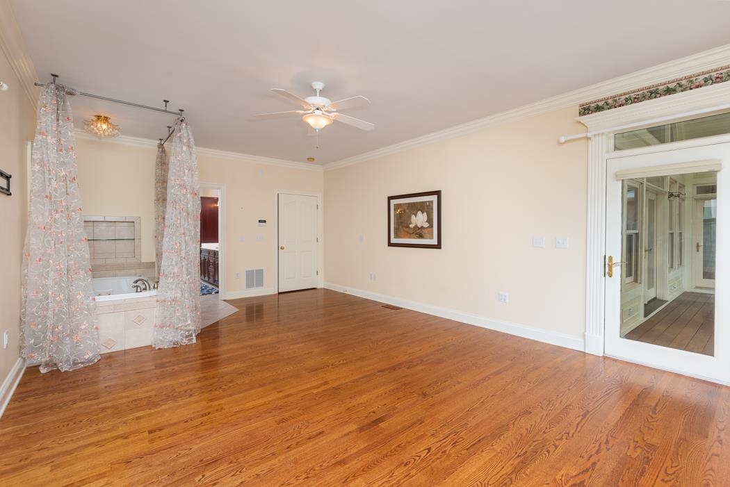 1068 Entry School Road Fishersville, VA 22939 - Photo 43 of 74 a view of empty room with wooden floor and fan