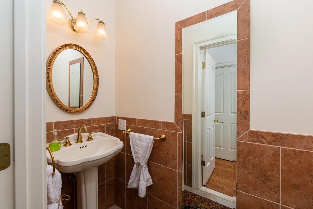 1068 Entry School Road Fishersville, VA 22939 - Photo 49 of 74 a bathroom with a sink and a mirror