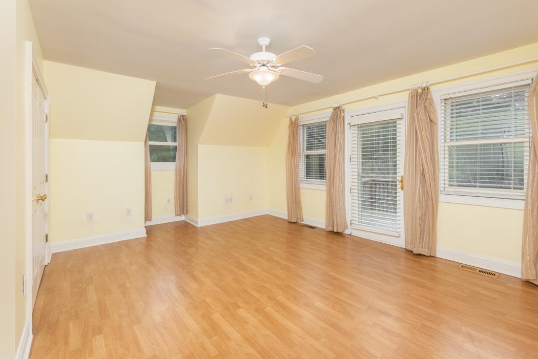 1068 Entry School Road Fishersville, VA 22939 - Photo 72 of 74 a view of a livingroom with a ceiling fan and window