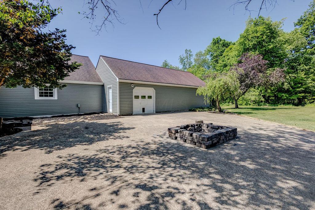 13887 Vincent Road Mount Vernon, OH 43050 - Photo 31 of 55 Firepit on Large Concrete Pad