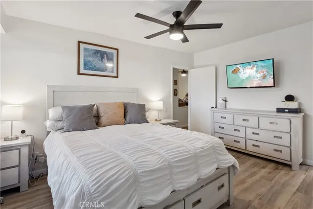 a bedroom with a bed and a cabinets