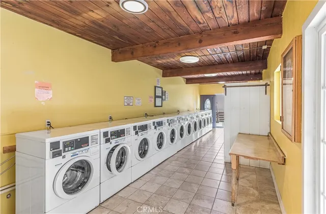 an aerial view of residential building and parking space