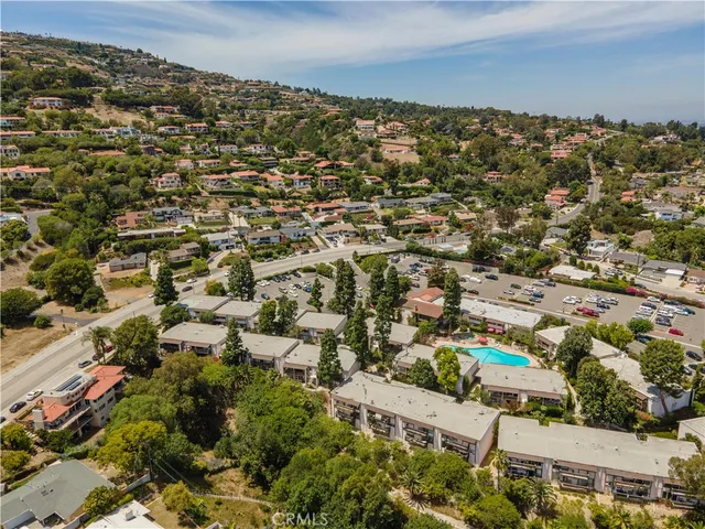 a view of an fountain in front of house