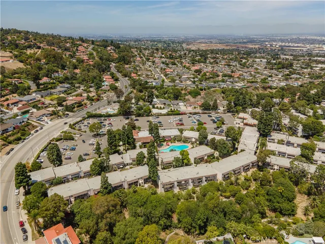 a sign that is sitting in front of flowers