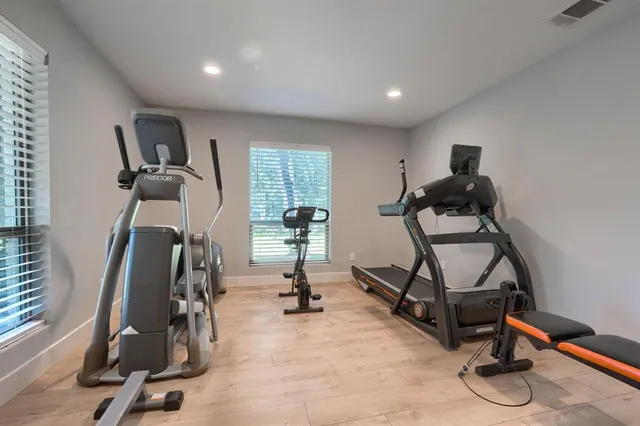 a view of a room with gym equipment