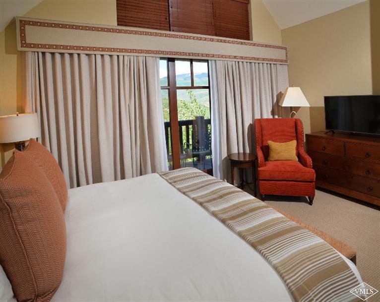 100 Bachelor Ridge Road, Unit 3704 Avon, CO 81620 - Photo 11 of 21 a bedroom with furniture and a window