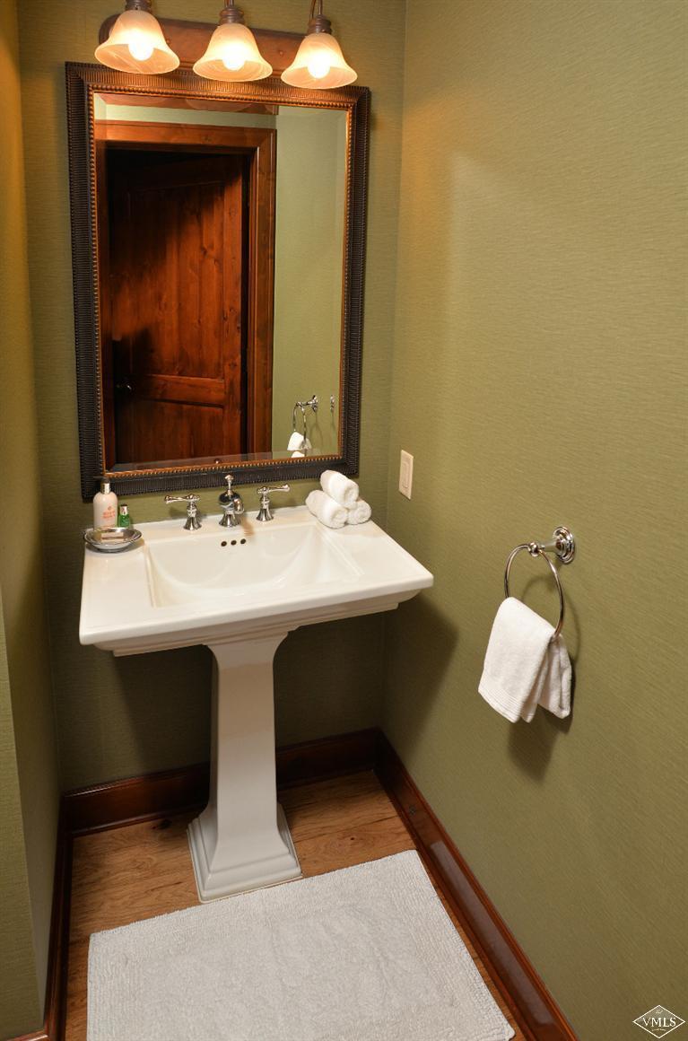 100 Bachelor Ridge Road, Unit 3704 Avon, CO 81620 - Photo 15 of 21 a bathroom with a sink and a mirror