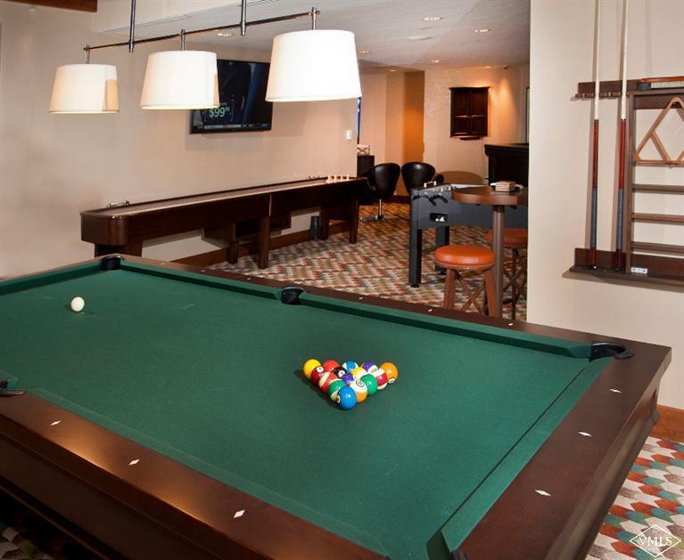 100 Bachelor Ridge Road, Unit 3704 Avon, CO 81620 - Photo 21 of 21 a living room with pool table