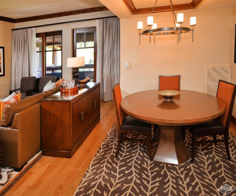 100 Bachelor Ridge Road, Unit 3704 Avon, CO 81620 - Photo 6 of 21 a view of a dining room with furniture and window