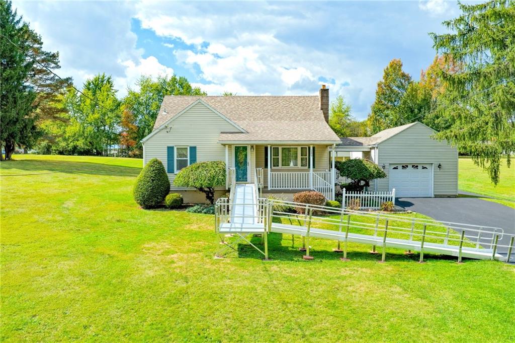 289 Scotland Lane New Castle, PA 16101 - Photo 1 of 35 a view of a house with a backyard patio and a swimming pool