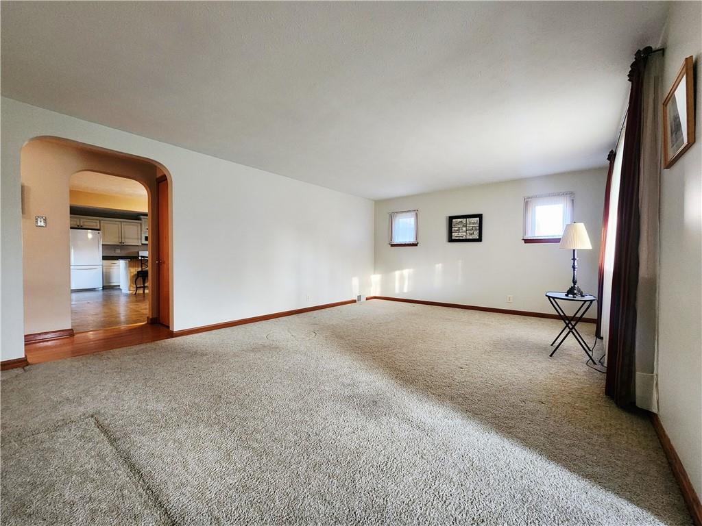 289 Scotland Lane New Castle, PA 16101 - Photo 14 of 35 an empty room with windows and entrance