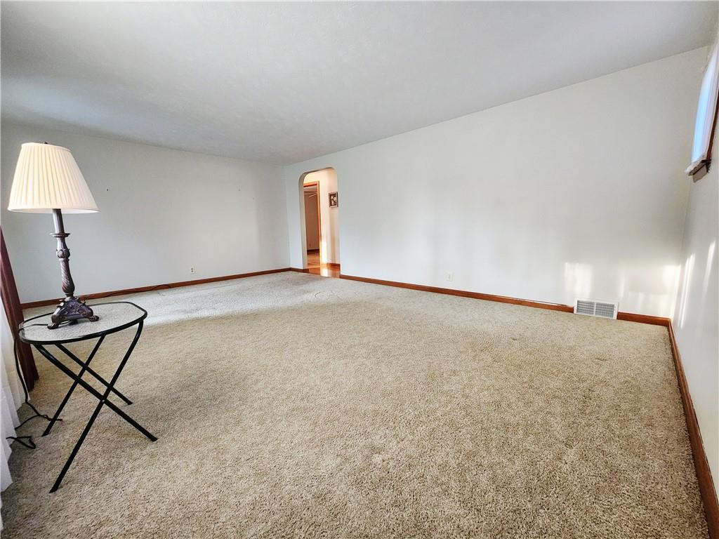 289 Scotland Lane New Castle, PA 16101 - Photo 15 of 35 a view of a room with gym equipment and wooden floor