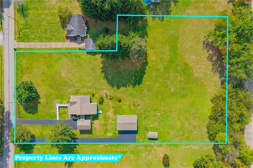 289 Scotland Lane New Castle, PA 16101 - Photo 3 of 35 an aerial view of residential houses with outdoor space and swimming pool