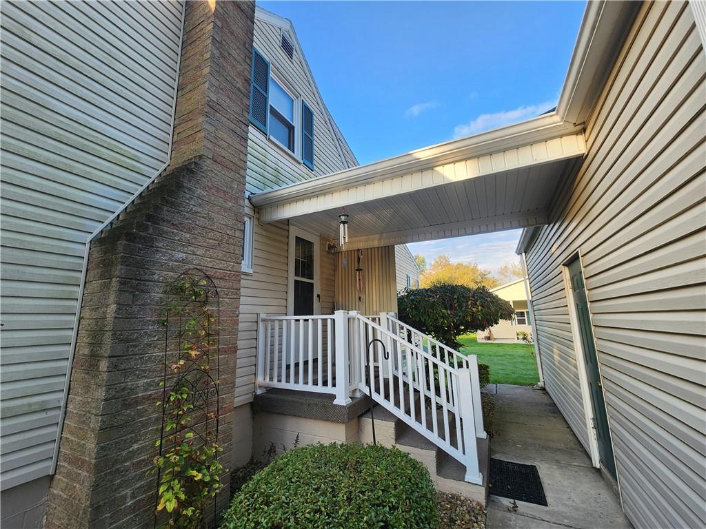 289 Scotland Lane New Castle, PA 16101 - Photo 8 of 35 a view of a porch with a floor to ceiling window and wooden fence