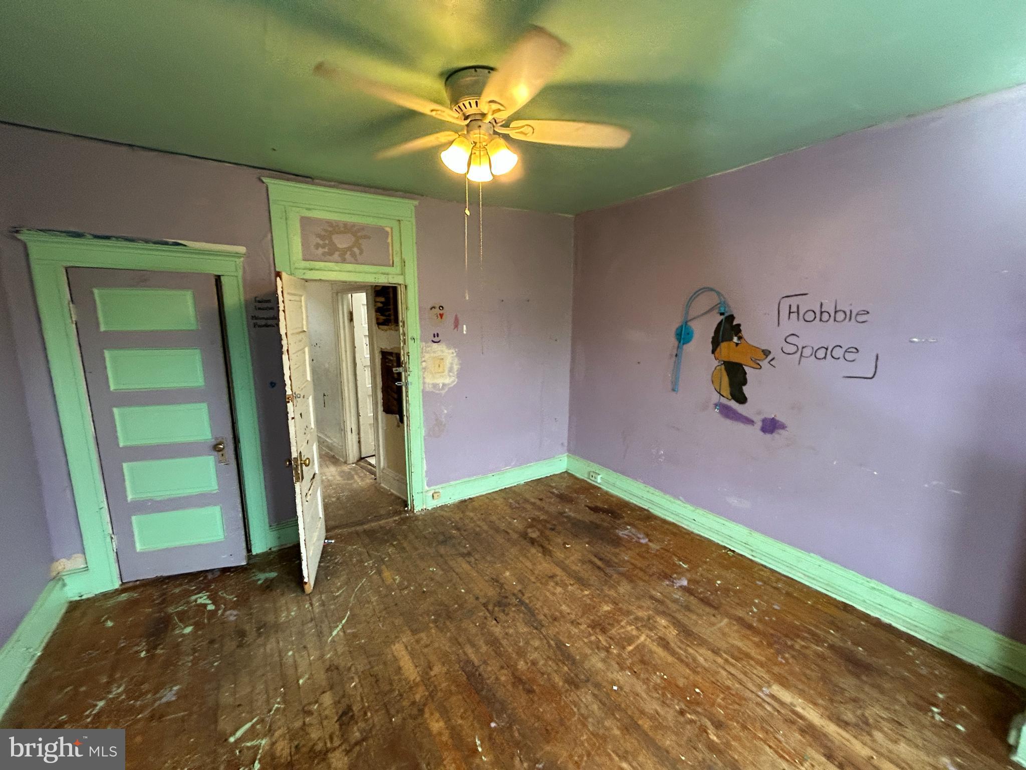 2904 Winchester Street Baltimore, MD 21216 - Photo 11 of 17 a view of empty room with front door