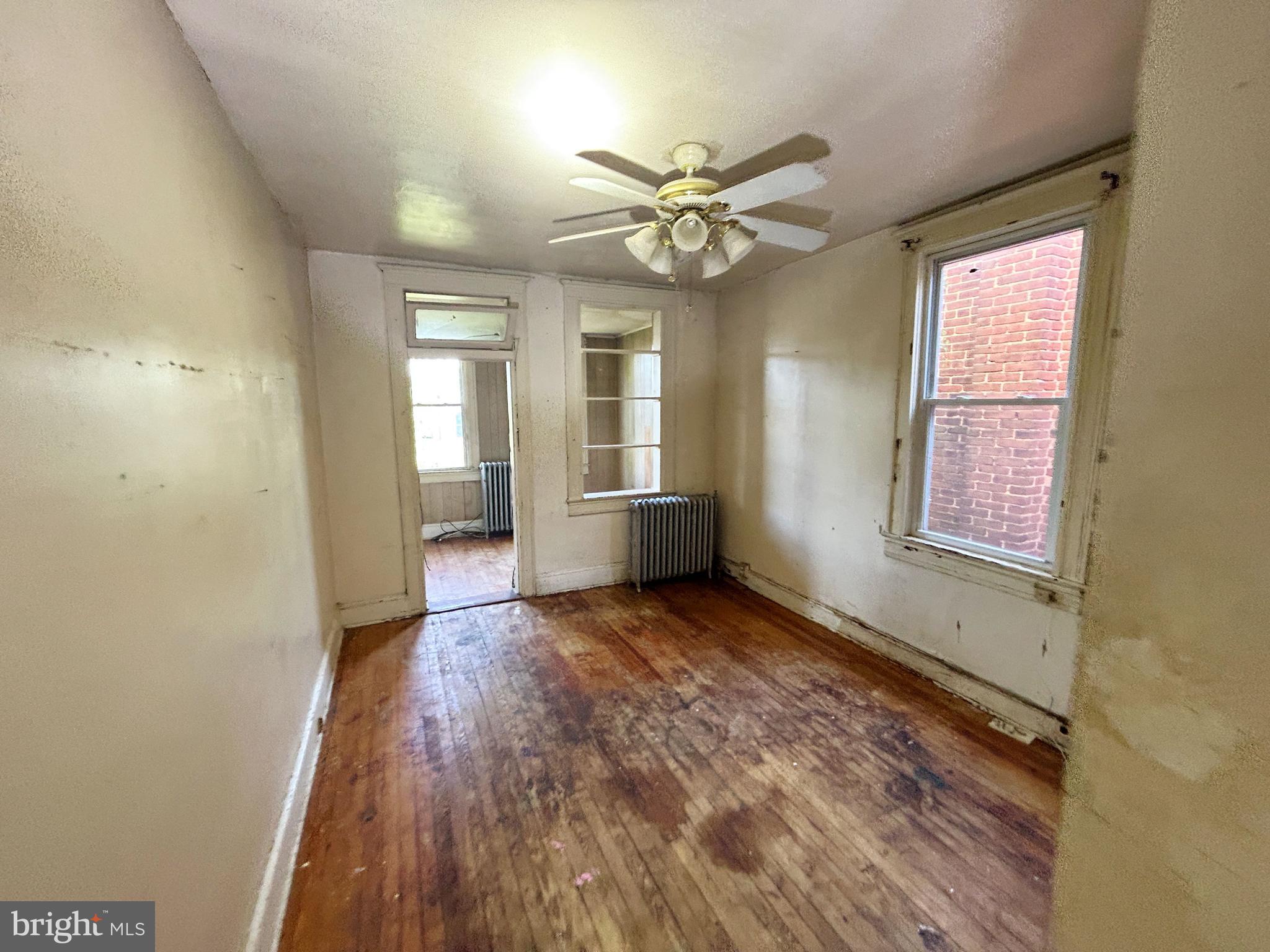 2904 Winchester Street Baltimore, MD 21216 - Photo 12 of 17 a view of an empty room with a window