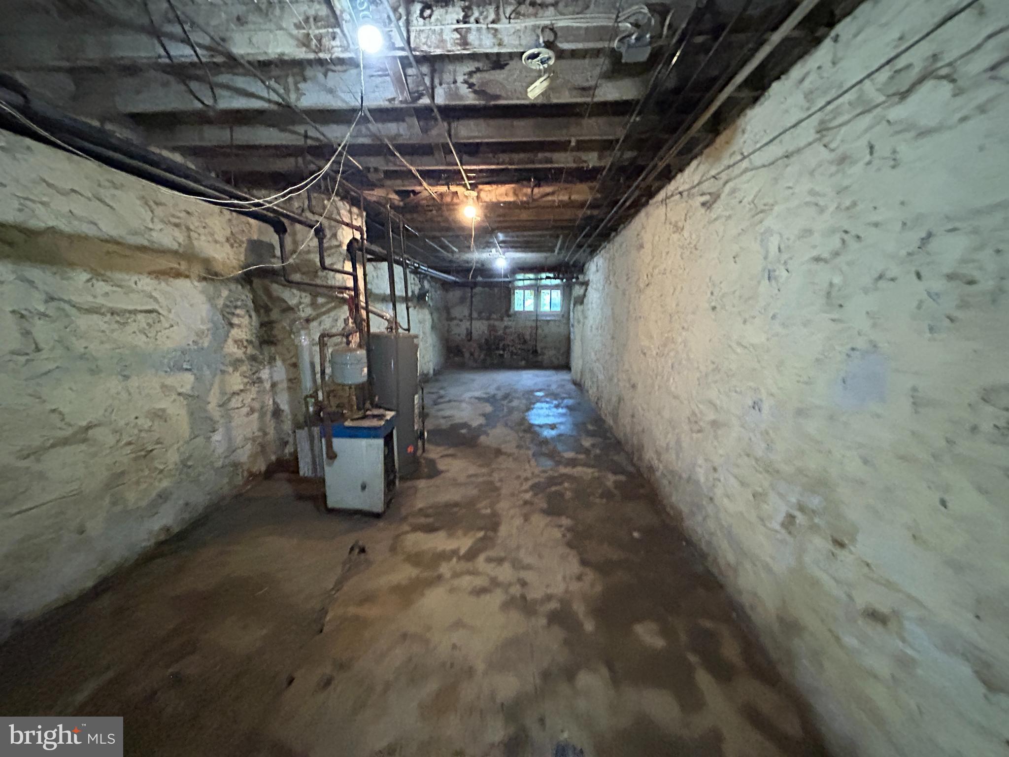 2904 Winchester Street Baltimore, MD 21216 - Photo 17 of 17 a view of water heater room
