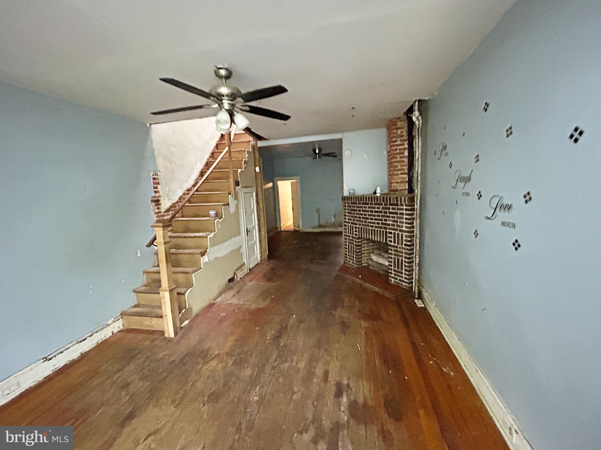 2904 Winchester Street Baltimore, MD 21216 - Photo 5 of 17 a view of entryway with wooden floor