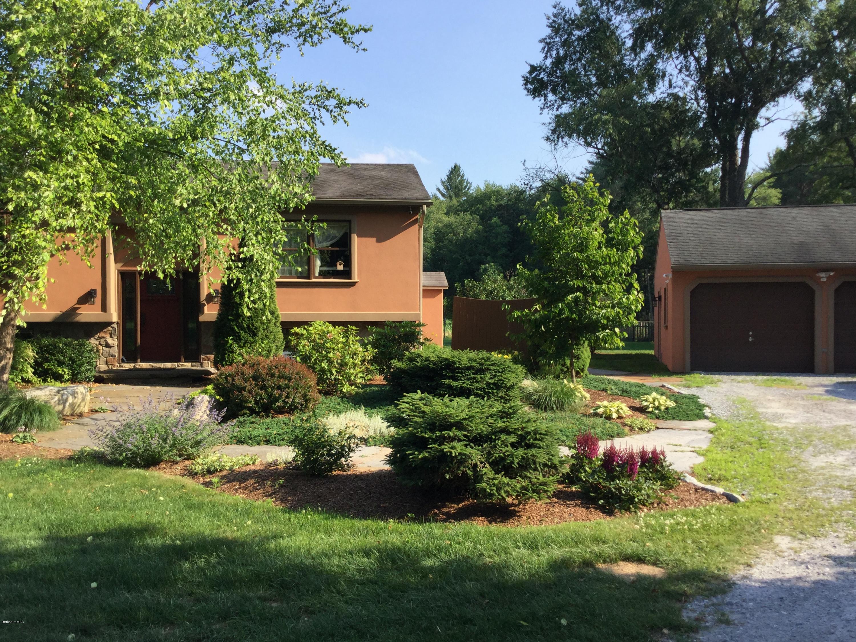 355 Salisbury Road Sheffield, MA 01257 - Photo 1 of 33 a house with a tree in front of it