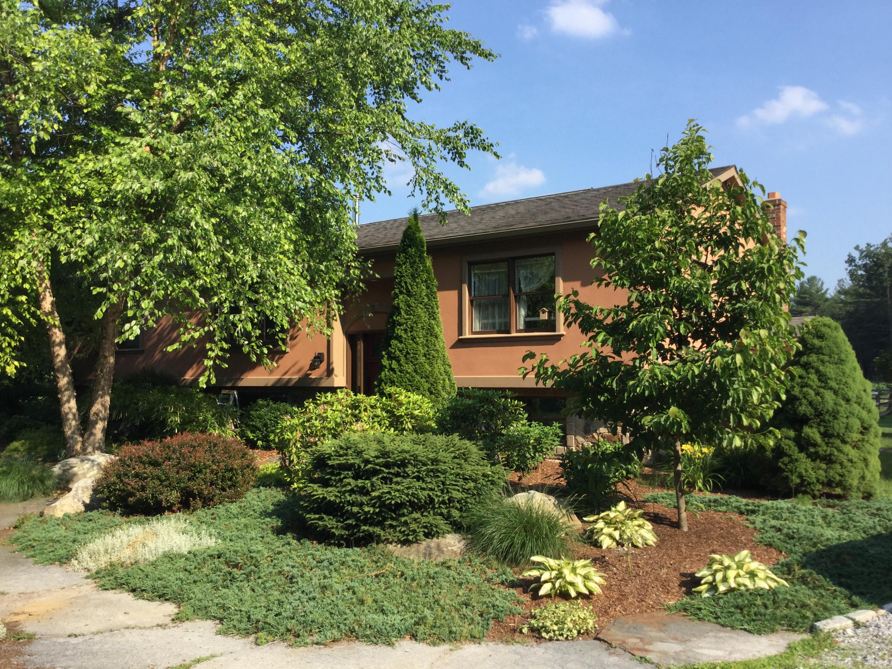 355 Salisbury Road Sheffield, MA 01257 - Photo 2 of 33 a front view of a house with a yard