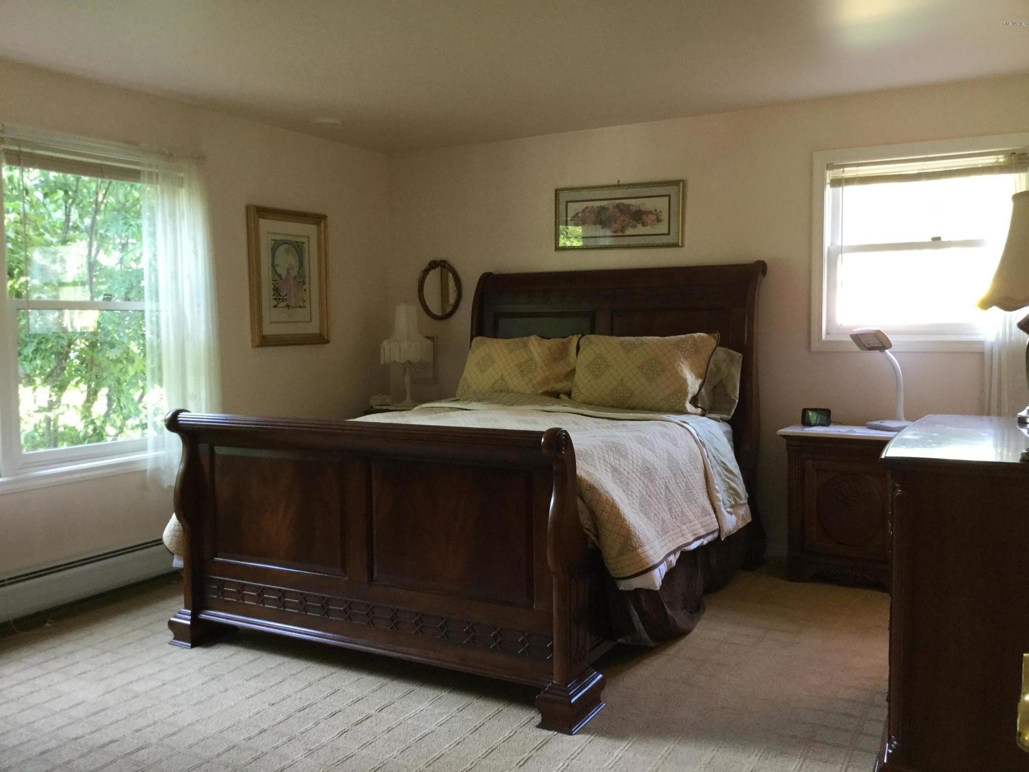 355 Salisbury Road Sheffield, MA 01257 - Photo 12 of 33 a bedroom with a bed and a window