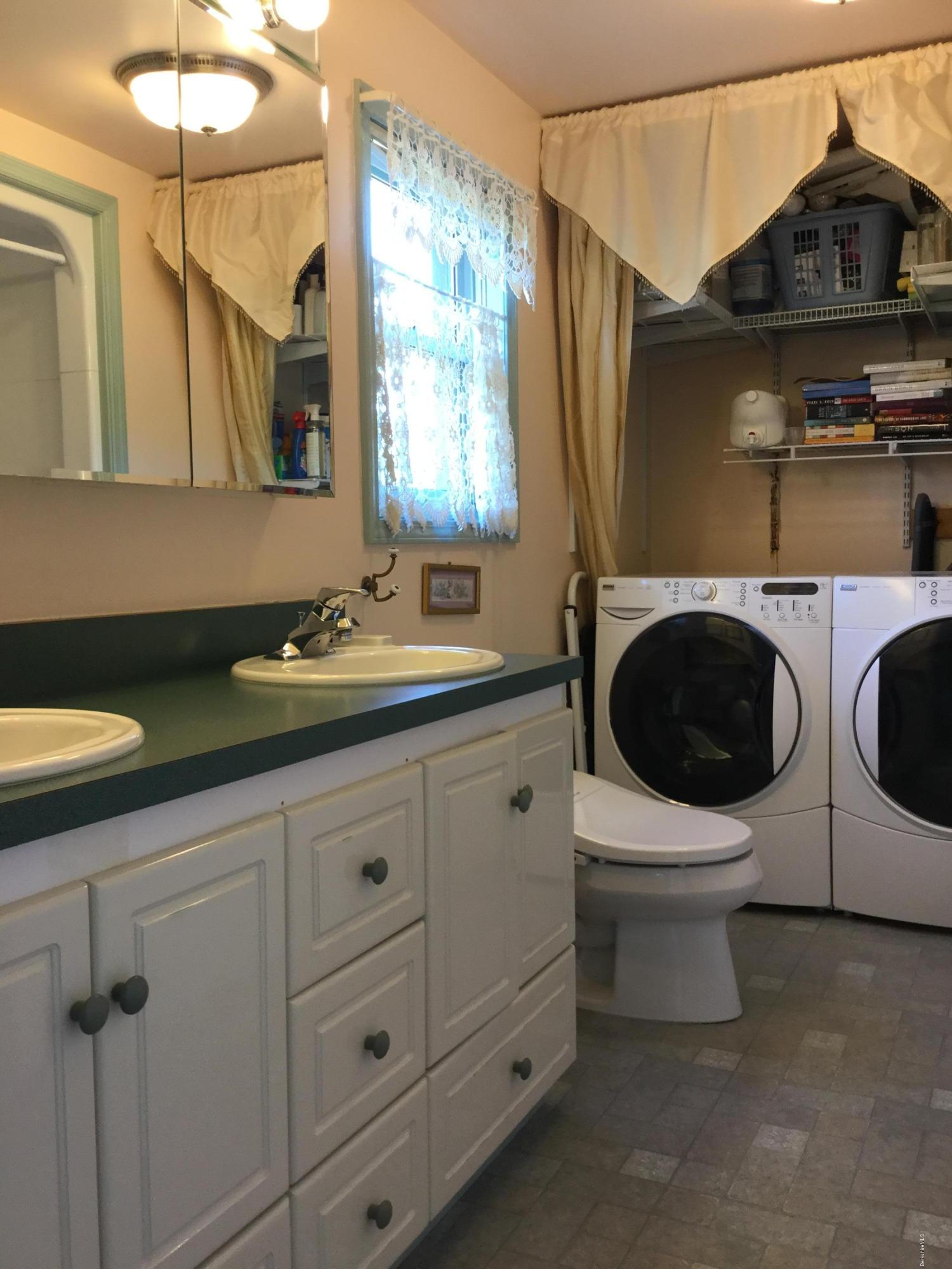 355 Salisbury Road Sheffield, MA 01257 - Photo 13 of 33 a bathroom with a sink a washer and dryer