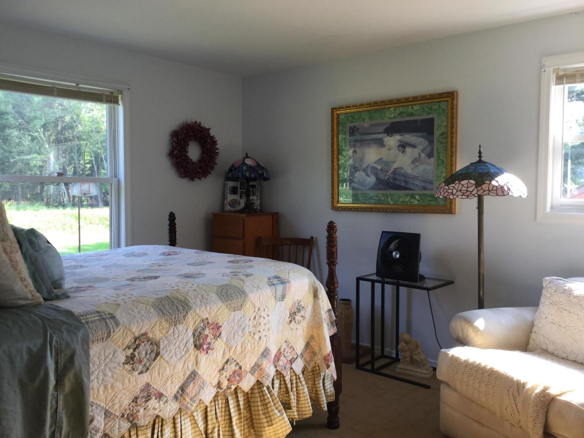 355 Salisbury Road Sheffield, MA 01257 - Photo 14 of 33 a bedroom with a bed and a window