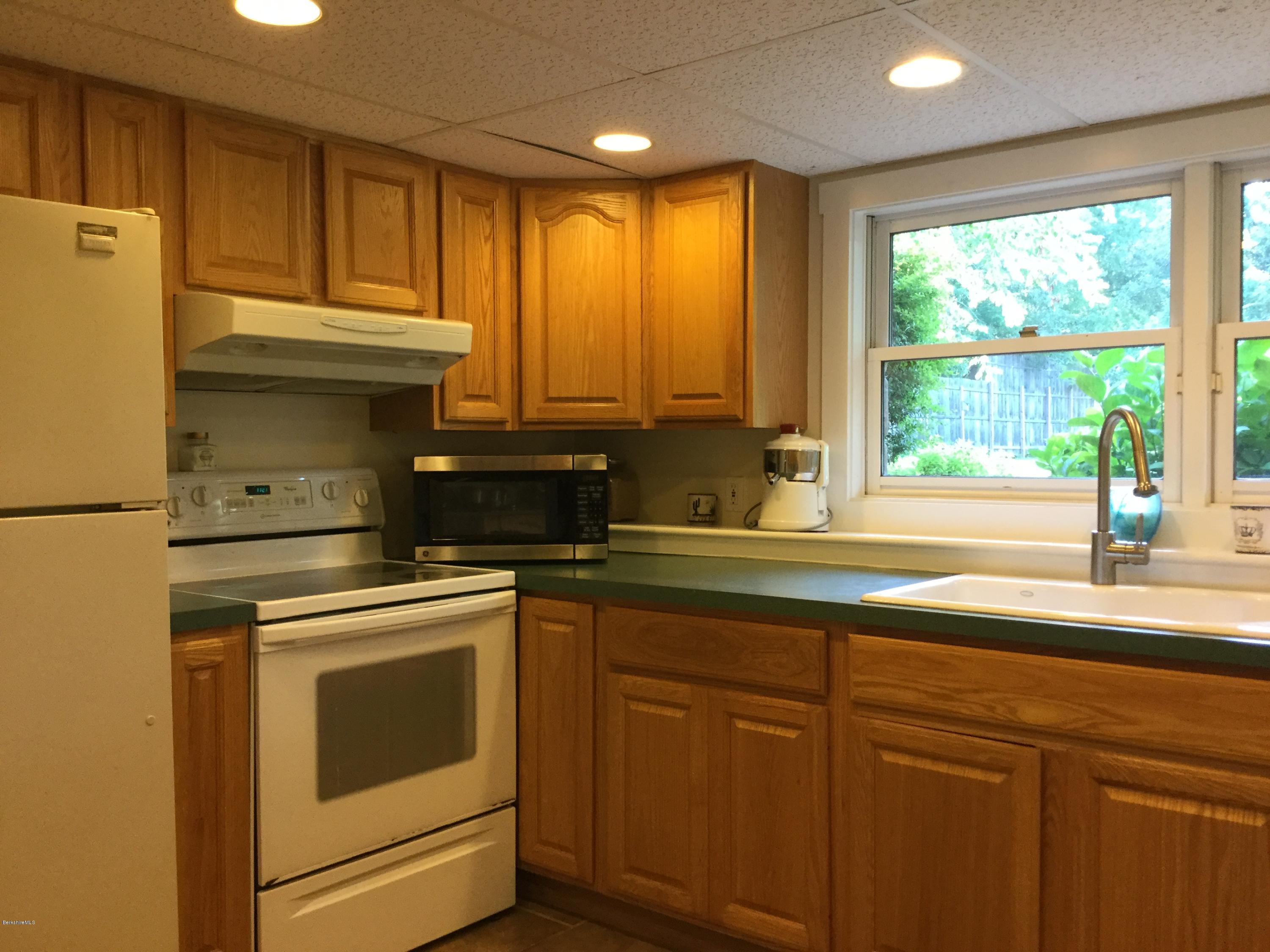 355 Salisbury Road Sheffield, MA 01257 - Photo 25 of 33 a kitchen with granite countertop cabinets stainless steel appliances and sink