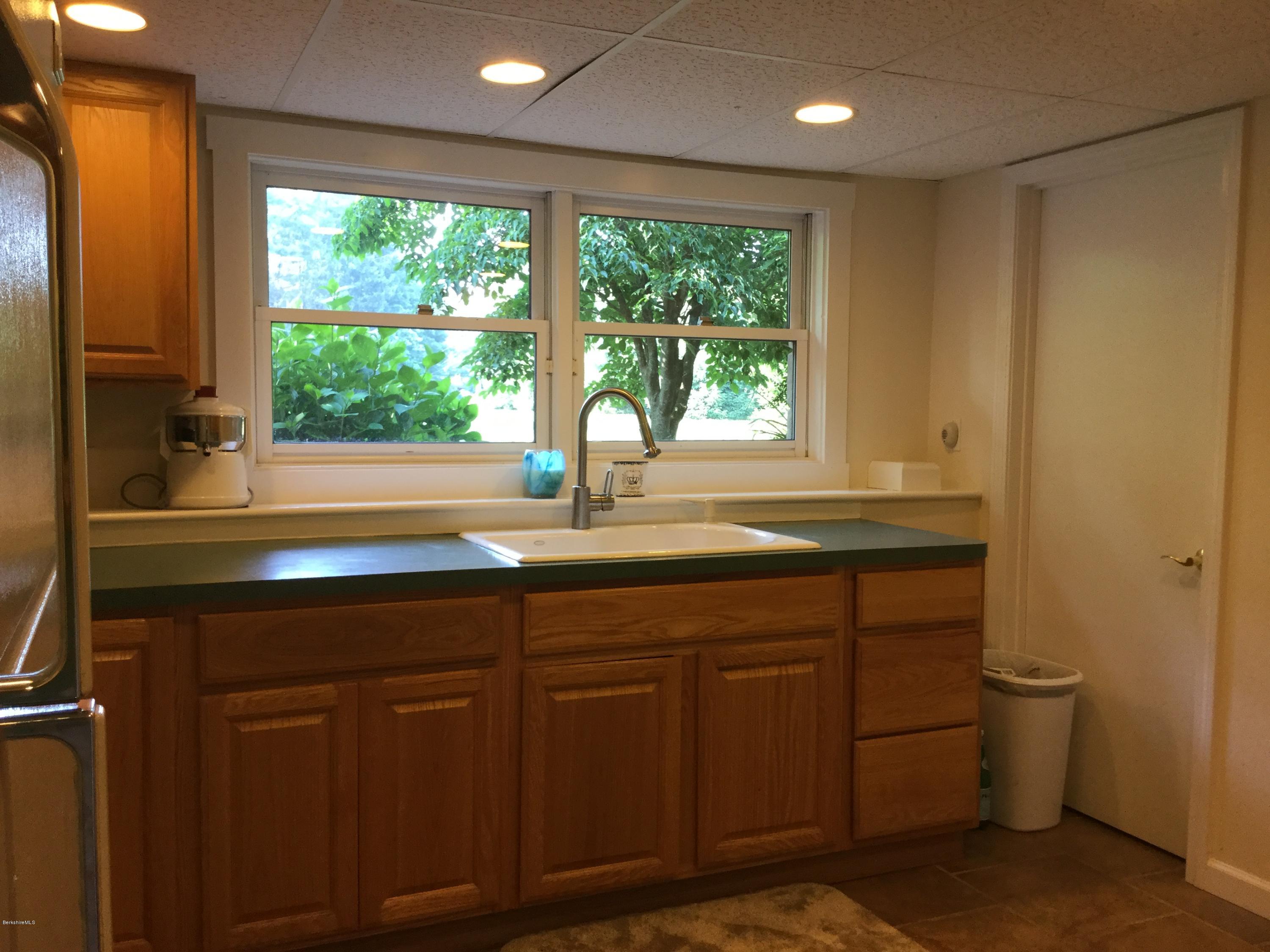 355 Salisbury Road Sheffield, MA 01257 - Photo 26 of 33 a kitchen with a sink and large window