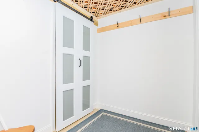 a picture of a room with windows