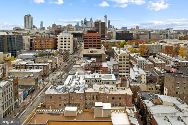 a view of a city with tall buildings