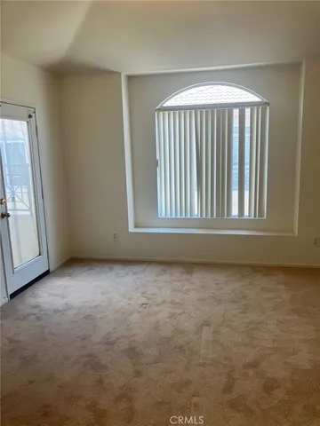 an empty room with window