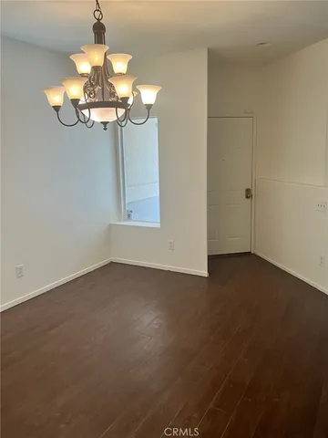 a view of a chandelier in big room