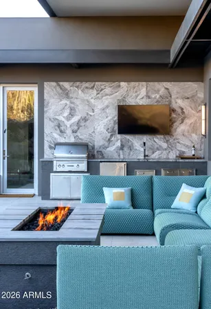 a kitchen with granite countertop a plate of white stainless steel appliances