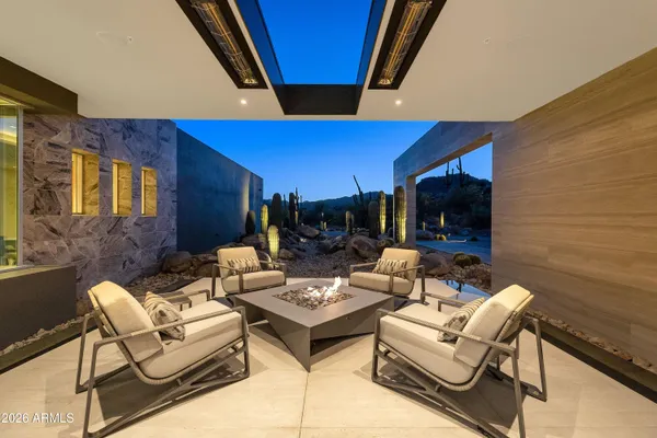 a large bathroom with a large tub shower sink and mirror