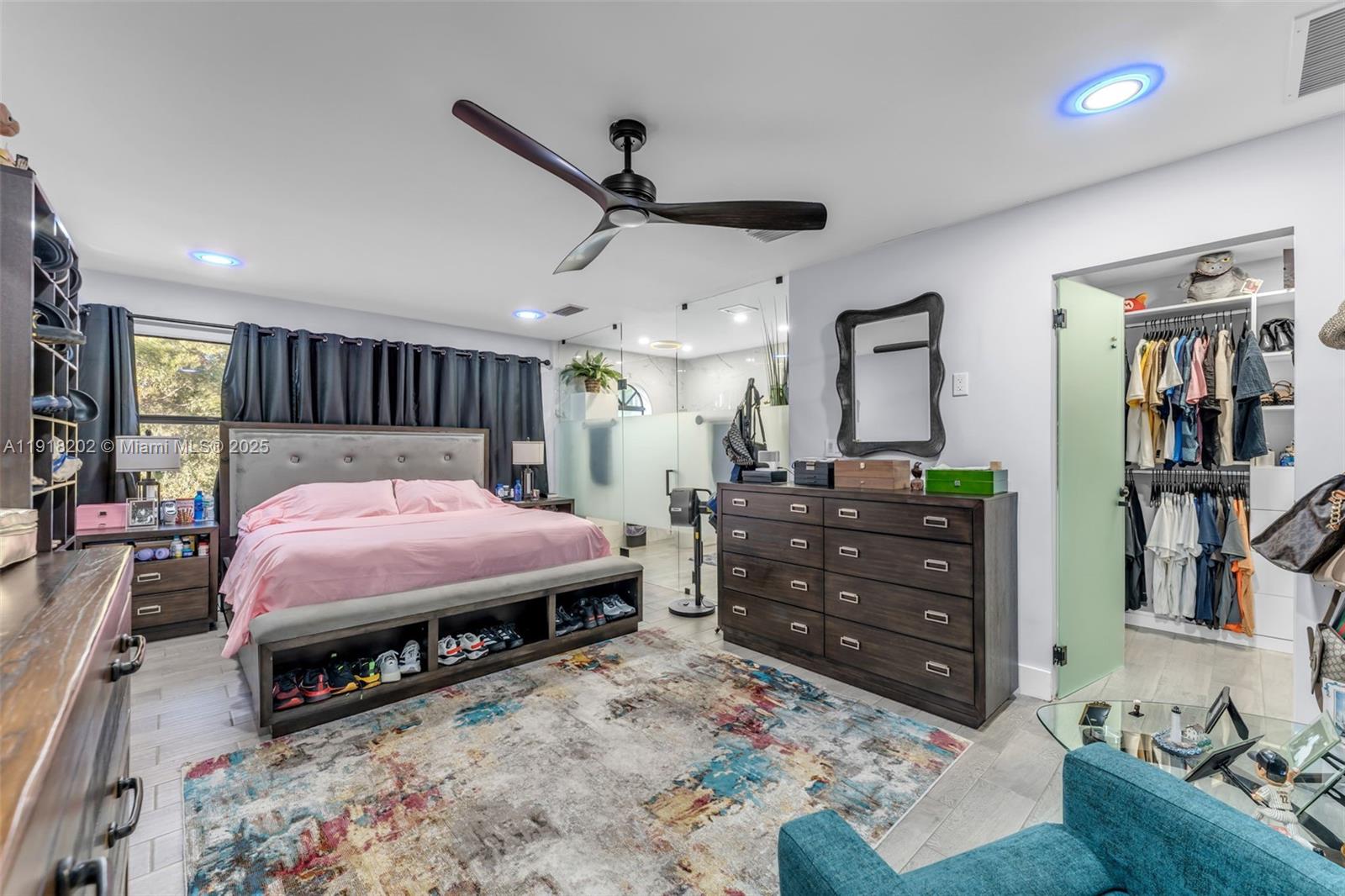 11830 Southwest 104th Lane Miami, FL 33186 - Photo 19 of 48 a bed room with a bed window and dresser