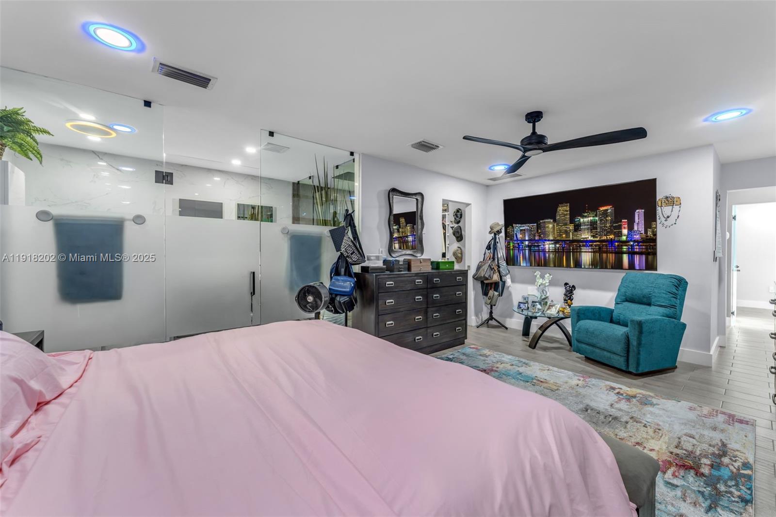 11830 Southwest 104th Lane Miami, FL 33186 - Photo 20 of 48 a bedroom with furniture and a flat screen tv