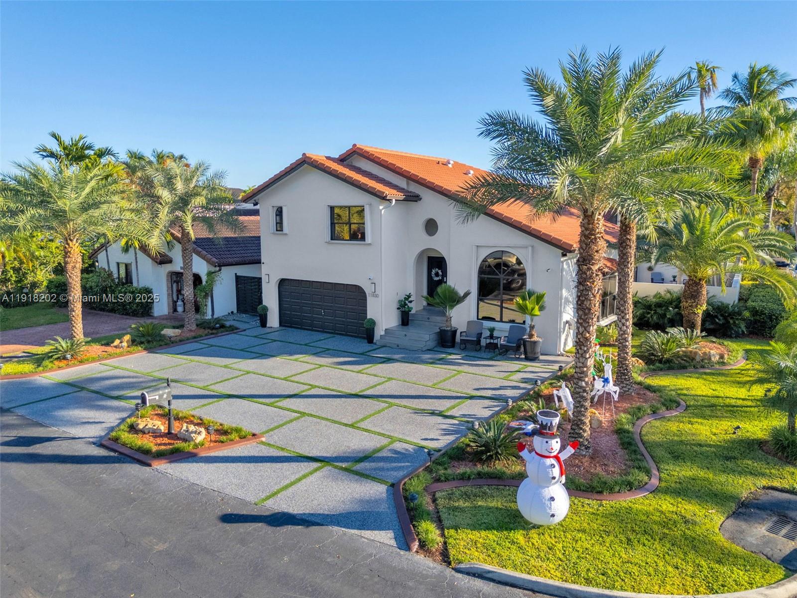 11830 Southwest 104th Lane Miami, FL 33186 - Photo 2 of 48 a view of a backyard with swimming pool