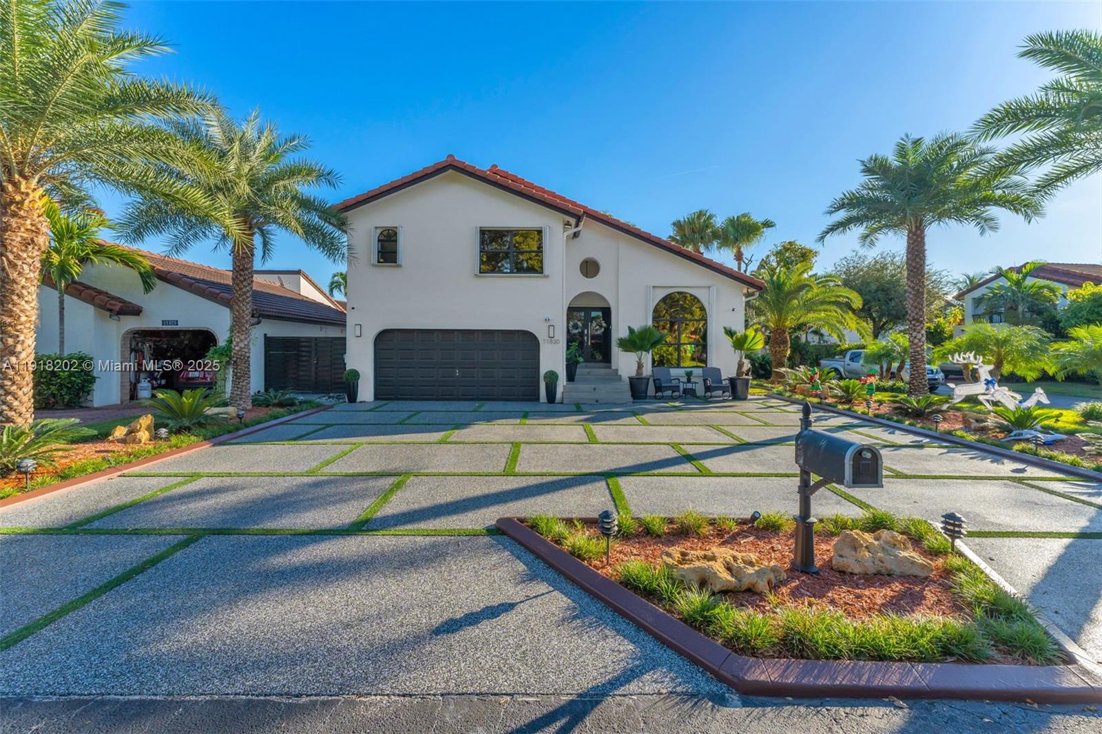 11830 Southwest 104th Lane Miami, FL 33186 - Photo 3 of 48 a view of a house with swimming pool and a yard