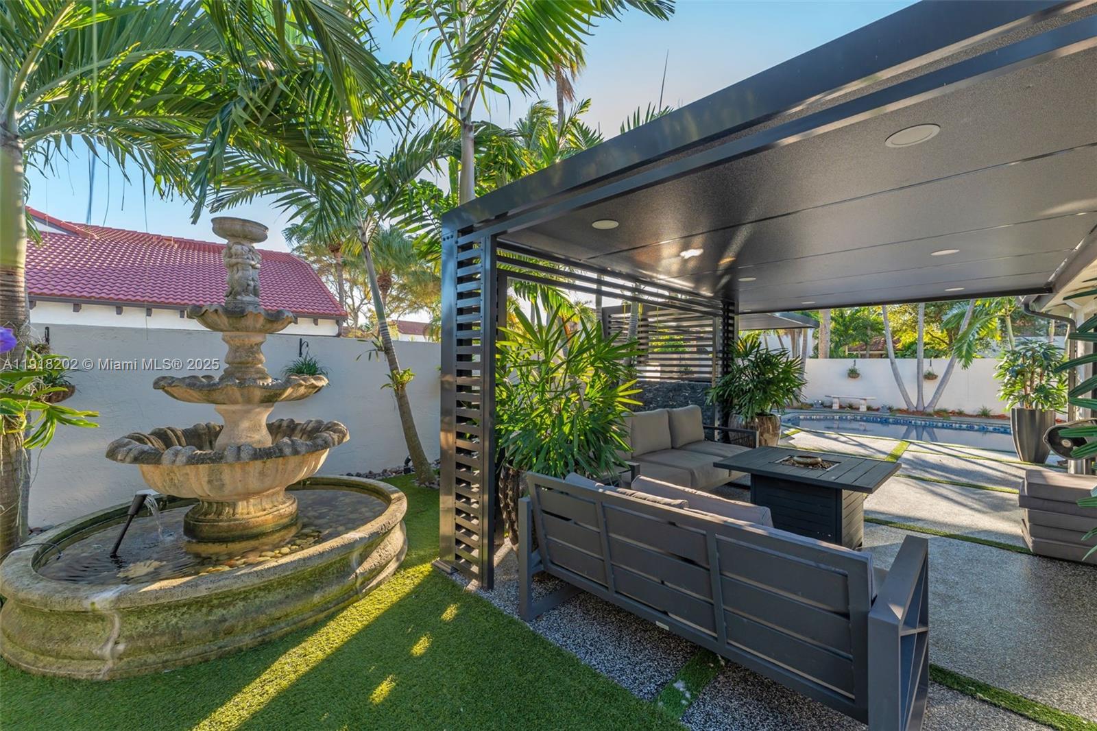 11830 Southwest 104th Lane Miami, FL 33186 - Photo 32 of 48 a view of a backyard with plants and a patio