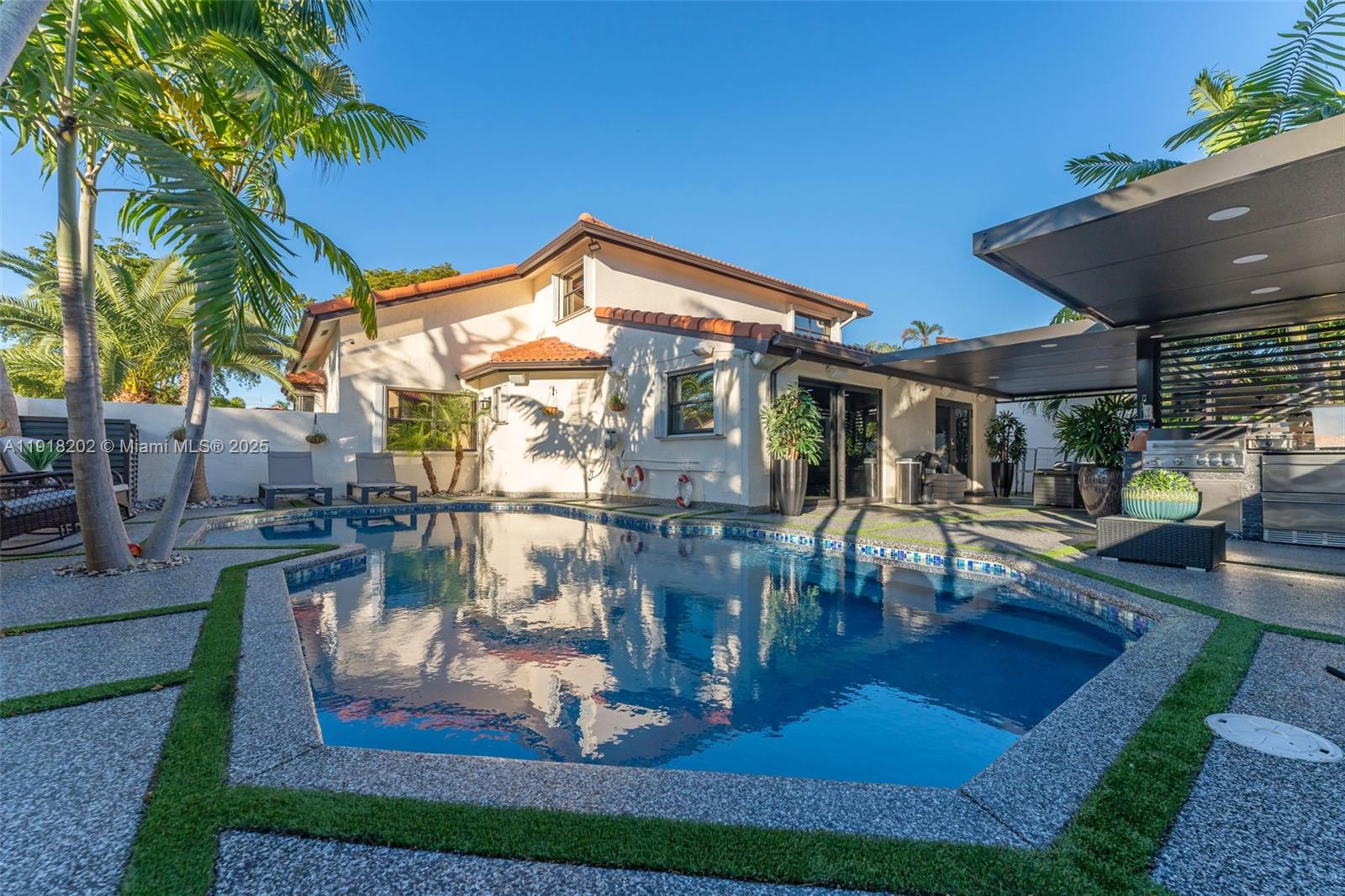 11830 Southwest 104th Lane Miami, FL 33186 - Photo 34 of 48 a view of house with swimming pool outdoor seating