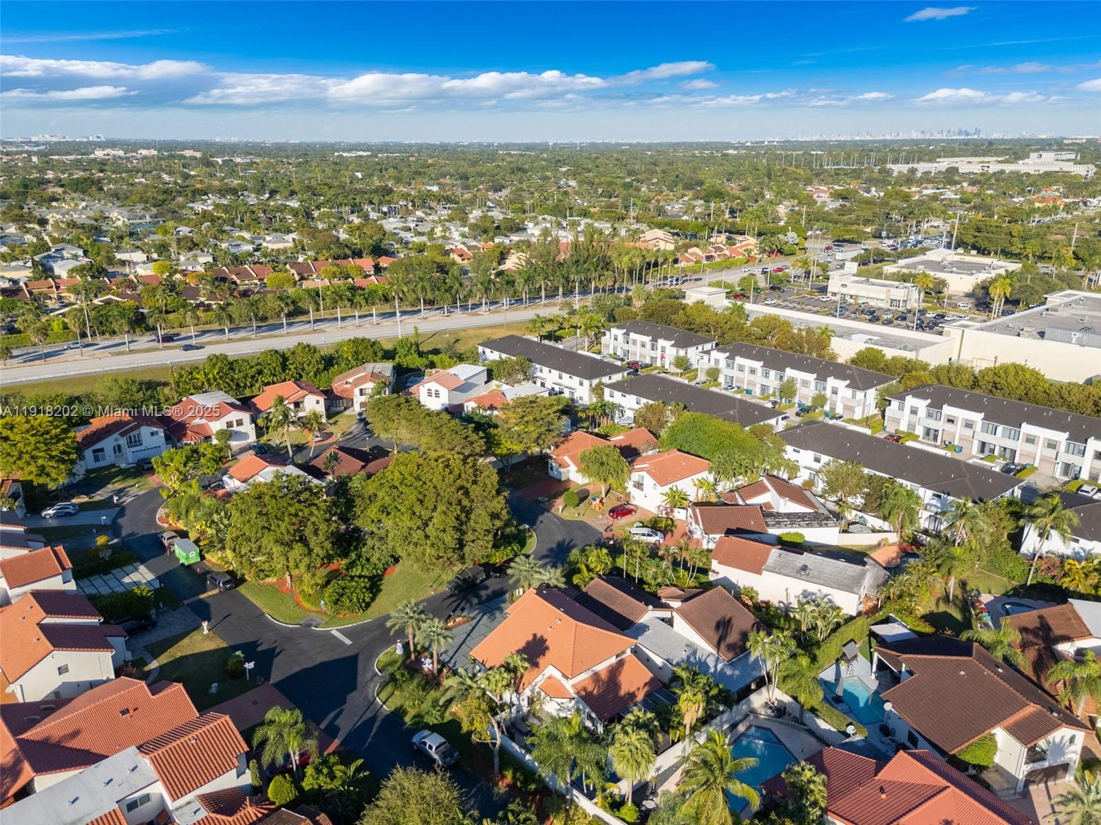 11830 Southwest 104th Lane Miami, FL 33186 - Photo 42 of 48 an aerial view of residential houses with outdoor space