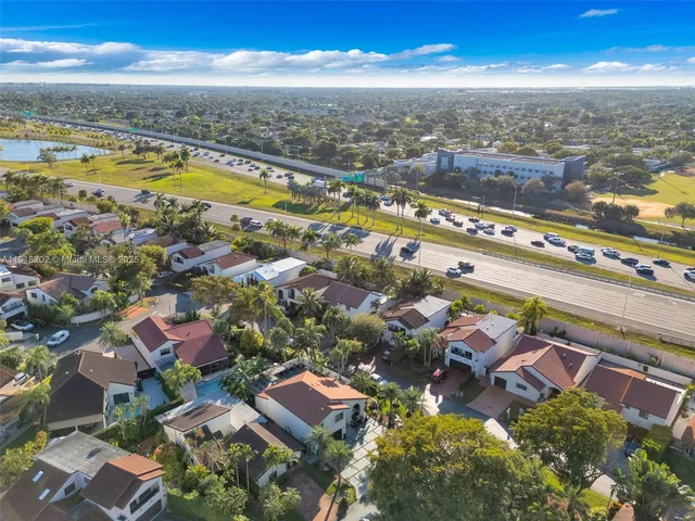 an aerial view of residential building with outdoor space
