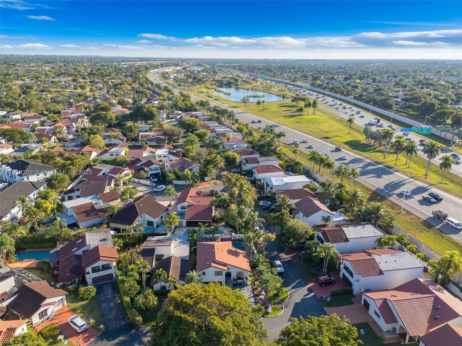 11830 Southwest 104th Lane Miami, FL 33186 - Photo 48 of 48 an aerial view of residential building with outdoor space