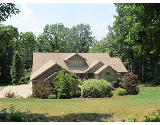 1299 Arona Road Irwin, PA 15642 - Photo 1 of 18 Exterior Front. All Brick quoin sidings. Gorgeous landscaped lot surrounded by mature trees. Very private setting.