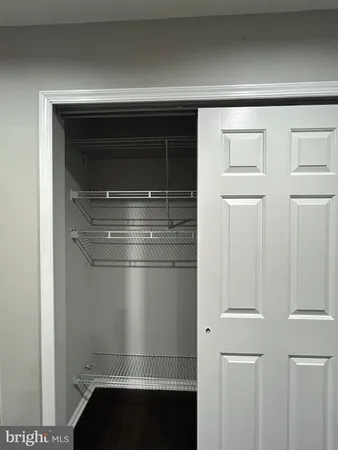 a refrigerator freezer sitting inside of a kitchen
