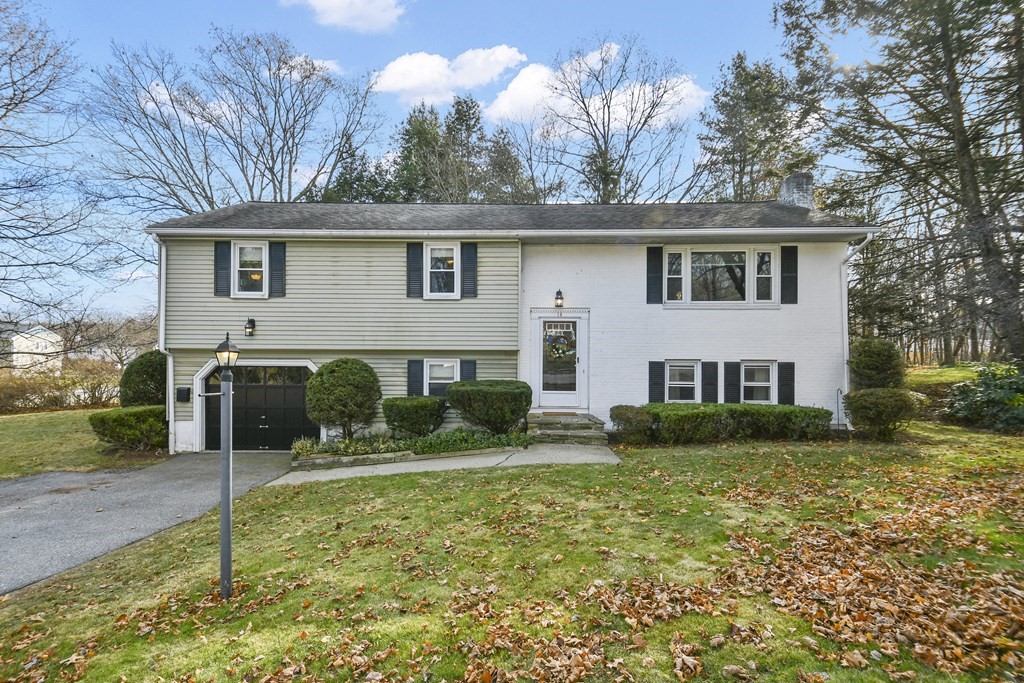 14 Oak Ridge Way Shrewsbury, MA 01545 - Photo 1 of 30 a view of a yard in front of a house with large tree