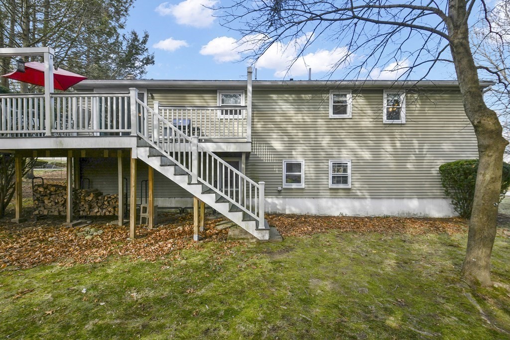 14 Oak Ridge Way Shrewsbury, MA 01545 - Photo 28 of 30 front view of a house with a yard