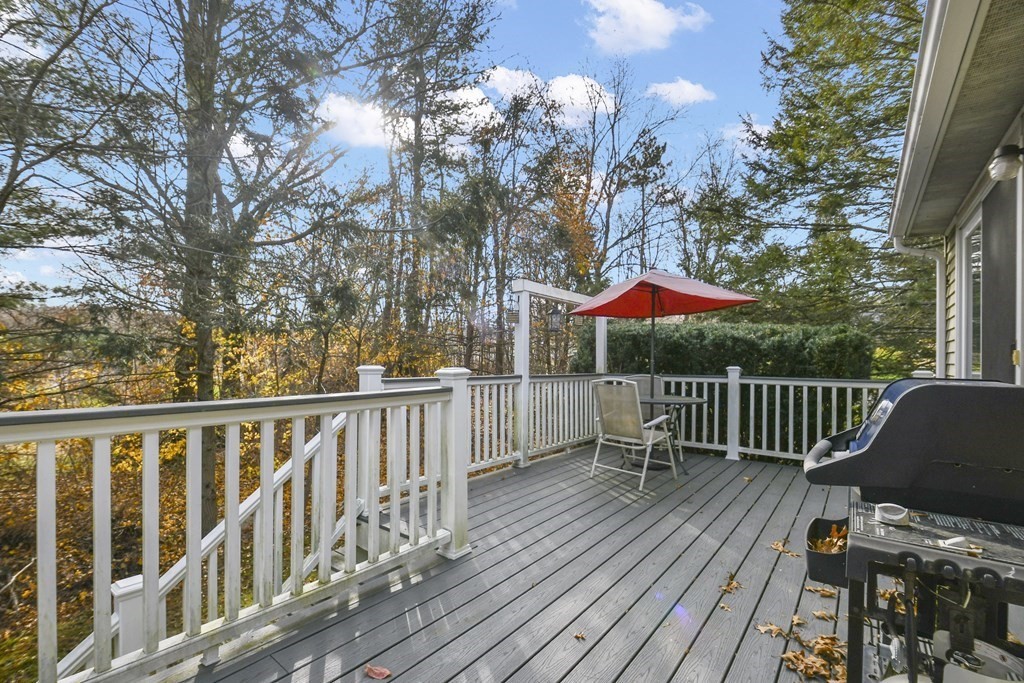 14 Oak Ridge Way Shrewsbury, MA 01545 - Photo 29 of 30 a balcony with wooden floor and outdoor seating