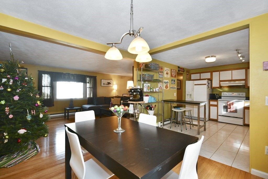 14 Oak Ridge Way Shrewsbury, MA 01545 - Photo 5 of 30 a view of a dining room with furniture window and wooden floor